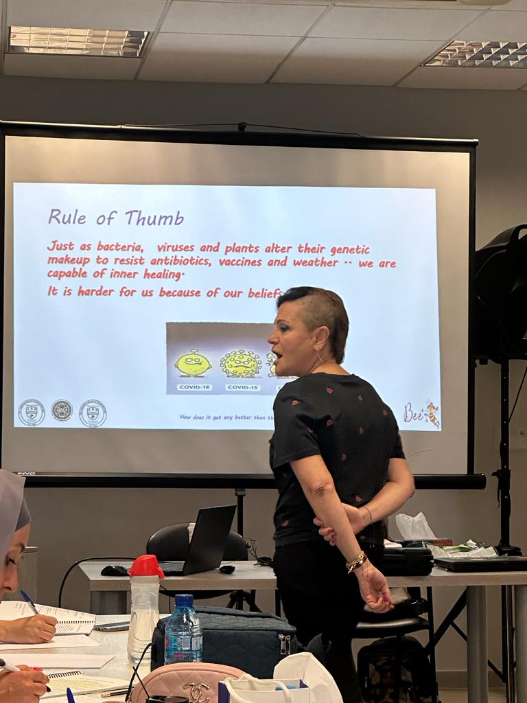 Coach Bee teaching an NLP class